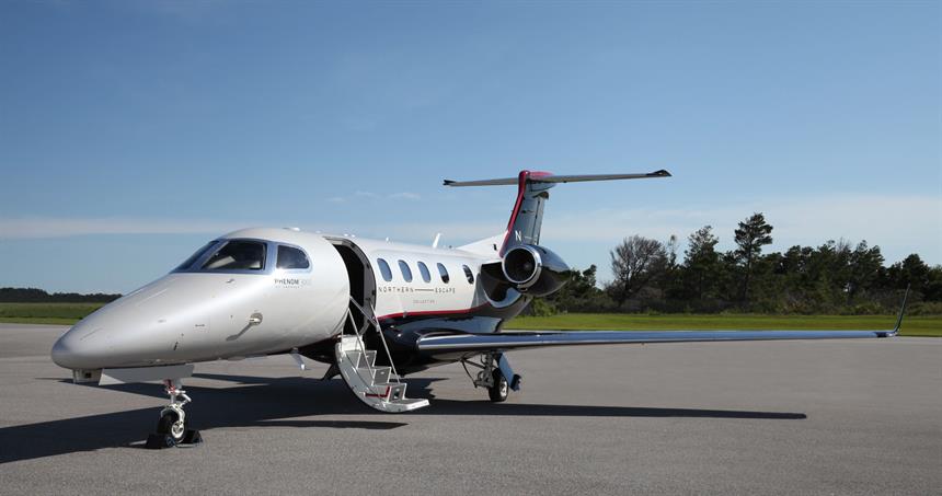 VH-NSQ Phenom 300